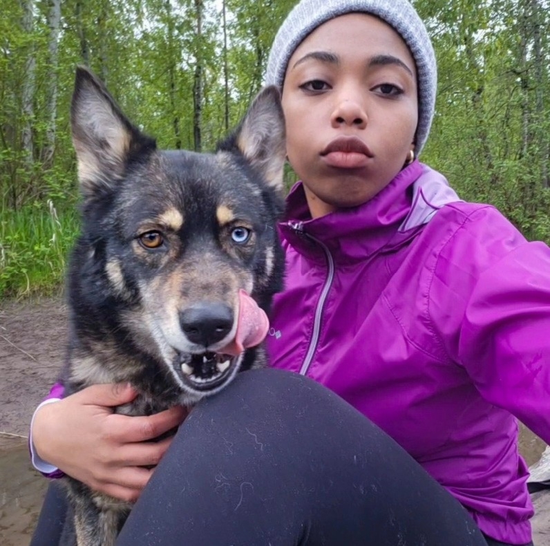 Vashti with a large dog with heterochromia